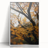 Art deco poster featuring a fall-themed design in warm orange and brown tones on a framed acrylic.