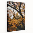Side view of a large stretched canvas depicting a fall scene with muted earth tones, ideal for kitchen wall art.