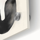 Close-up of an abstract minimalist wall art piece printed on acrylic glass, showcasing a blend of soft pastel colors, geometric shapes, and smooth textures, perfect for modern decor.