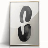 Framed acrylic wall art featuring a minimalist abstract design in gold tones, ideal for modern decor. The piece showcases elegant lines against a neutral background, enhancing any interior space with a touch of sophistication.