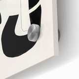 Close-up of an abstract minimalist wall art piece, showcasing vibrant colors and geometric shapes, printed on acrylic glass to enhance its modern aesthetic.