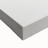 Close-up of an abstract minimalist wall art design on stretched canvas, showcasing soft pastel colors and geometric shapes, perfect for modern home decor.