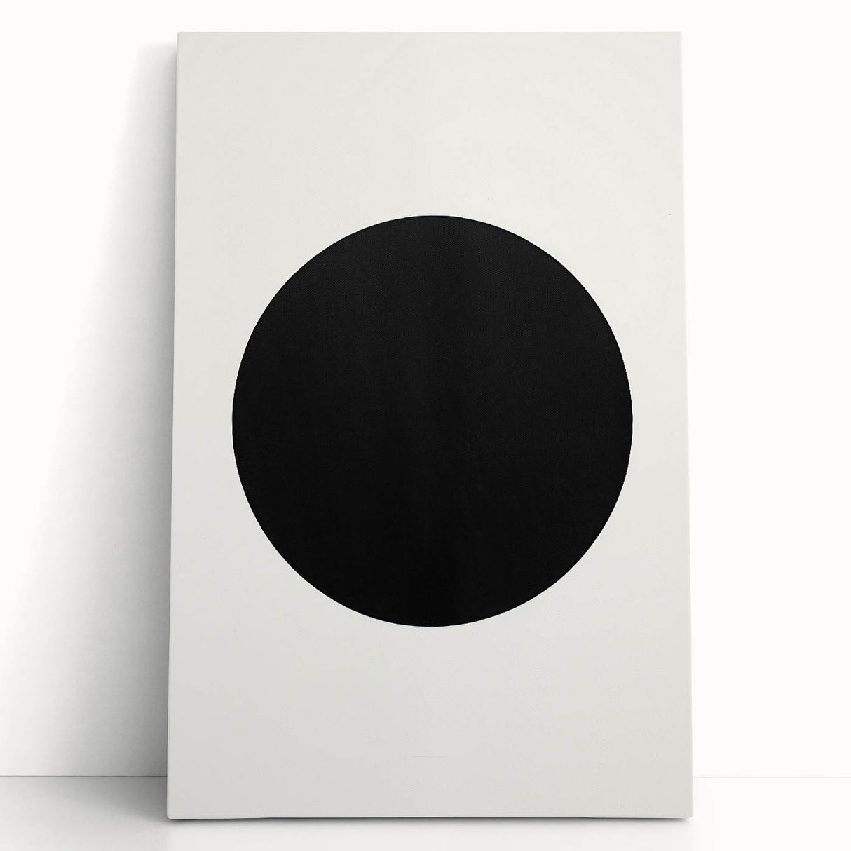 Abstract minimalist wall art on stretched canvas, featuring soft pastel colors and geometric shapes, leaning against a neutral wall, ideal for modern decor.