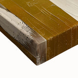 Close-up of a minimalist abstract wall art piece on stretched canvas, showcasing soft pastel colors and fluid shapes, perfect for modern home decor.