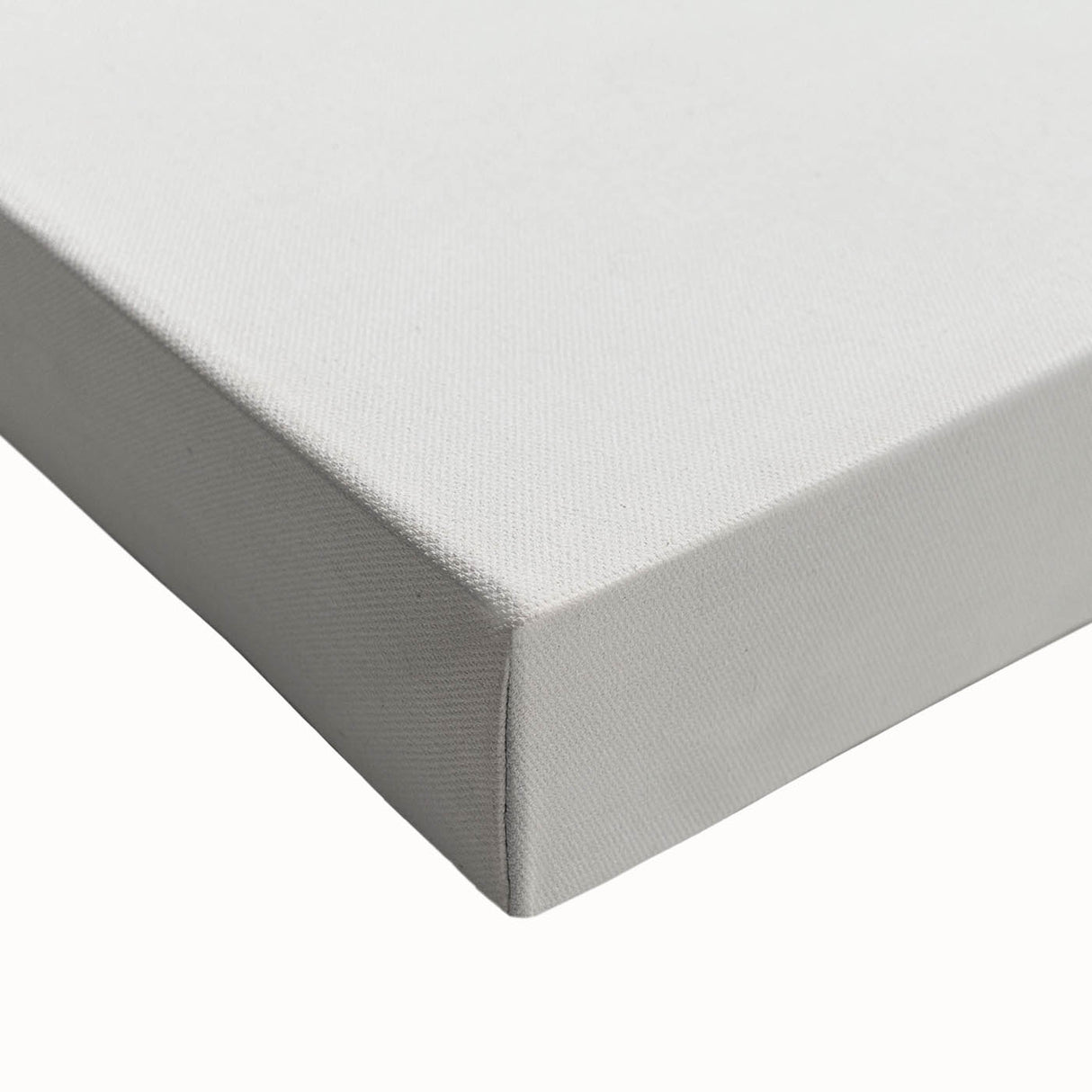 Close-up of abstract minimalist wall art on stretched canvas, showcasing a blend of soft pastel colors and geometric shapes, perfect for modern home decor.