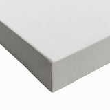 Close-up of abstract minimalist wall art on stretched canvas, showcasing a blend of soft pastel colors and geometric shapes, perfect for modern home decor.