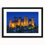 Elegant black-framed landscape artwork featuring a majestic castle surrounded by lush greenery, designed with a classic mat for a sophisticated presentation. Perfect for enhancing home decor, this piece adds a touch of timeless beauty to any room.