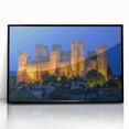 Framed acrylic print showcasing a majestic castle landscape with vibrant colors and intricate details, presented in a sleek black frame for an elegant touch. Perfect for enhancing home decor with a touch of royalty.