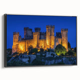 Framed canvas artwork showcasing a vibrant landscape with an intricate castle set against a dramatic sky, featuring a sleek black frame for modern decor.