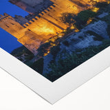 Rolled canvas artwork showcasing a vibrant landscape with a majestic castle, featuring rich colors and detailed textures, ideal for home decor.