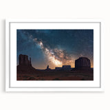 Framed landscape artwork showcasing dramatic cliffs against a vibrant sunset, elegantly matted in white, perfect for enhancing modern home decor.