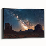 Framed canvas artwork depicting dramatic cliffs and rugged landscapes in a black frame, showcasing vibrant colors and scenic details, ideal for home decor.