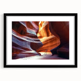 Framed landscape art print showcasing majestic canyons in rich earthy tones, elegantly matted in black, perfect for enhancing home decor and adding a natural touch.