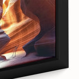 Close-up of a framed landscape canvas depicting vibrant canyons with rich colors and intricate textures, perfect for enhancing home decor with natural beauty.