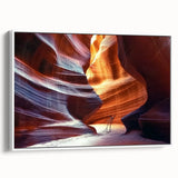 Framed landscape canvas print showcasing breathtaking canyons in warm earth tones, elegantly displayed from a side view against a white background, perfect for home decor.