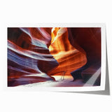 Stunning rolled print showcasing a vibrant landscape of canyons at sunset, featuring rich hues of orange and purple, ideal for home decor or art collection.