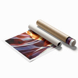 Stunning landscape print showcasing vibrant canyons in warm earth tones, rolled and packaged securely in a protective tube, perfect for home decor.
