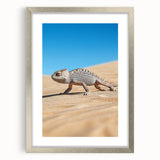 Framed desert landscape artwork with a silver mat, showcasing a stunning sunset over sand dunes, ideal for home decor and interior design enhancement.