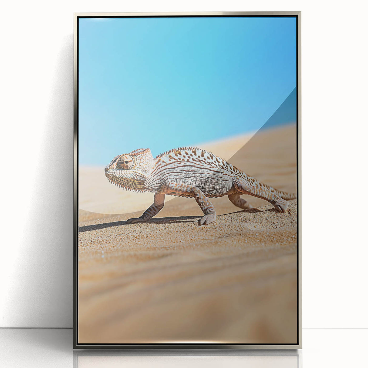 Framed acrylic landscape artwork depicting a serene desert scene with warm colors, showcasing a silver frame that enhances the visual appeal, perfect for home decor.