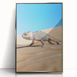 Framed acrylic landscape artwork depicting a serene desert scene with warm colors, showcasing a silver frame that enhances the visual appeal, perfect for home decor.
