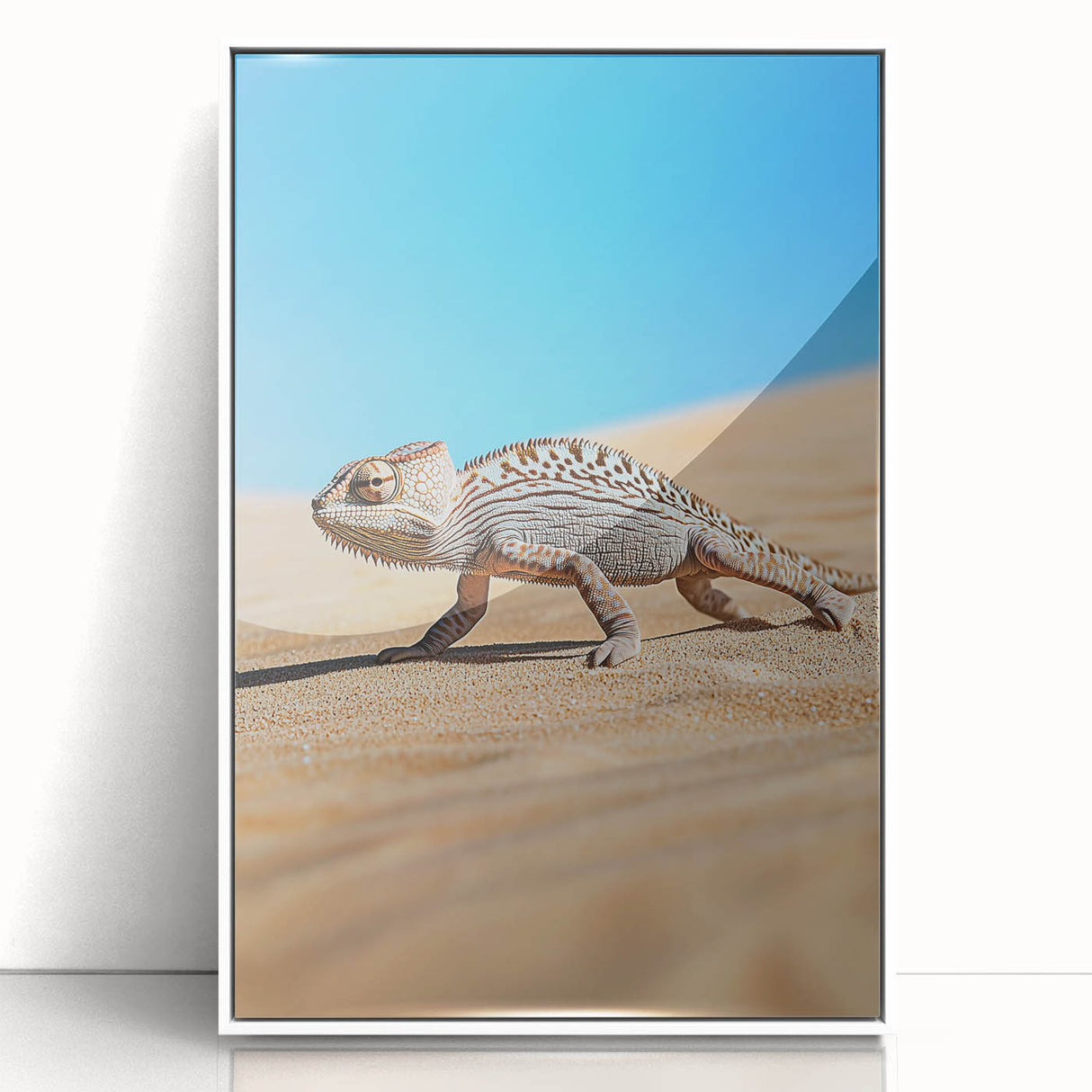 Framed acrylic artwork showcasing a vibrant desert landscape with warm hues of orange and yellow, presented in a sleek white frame, perfect for modern home decor.
