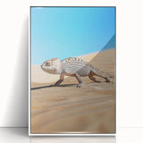 Framed acrylic artwork showcasing a vibrant desert landscape with warm hues of orange and yellow, presented in a sleek white frame, perfect for modern home decor.