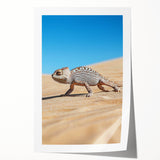 Vibrant rolled print showcasing a stunning desert landscape with warm sandy tones and a clear blue sky, elegantly packaged in a protective cardboard tube. Perfect for home decor or art enthusiasts.