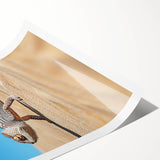 Desert landscape rolled canvas print showcasing vibrant earth tones and intricate textures, elegantly packaged in a protective cardboard tube for easy display.