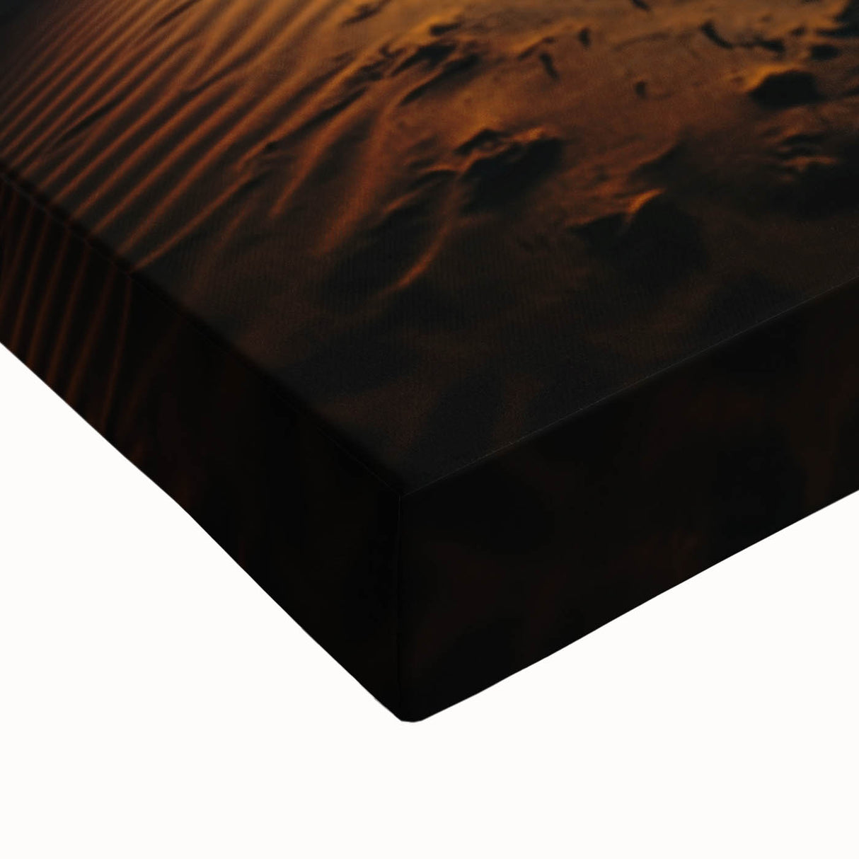 Close-up of a stretched canvas print showcasing a vibrant desert landscape with rolling dunes, rich golden tones, and soft shadows, perfect for home decor.