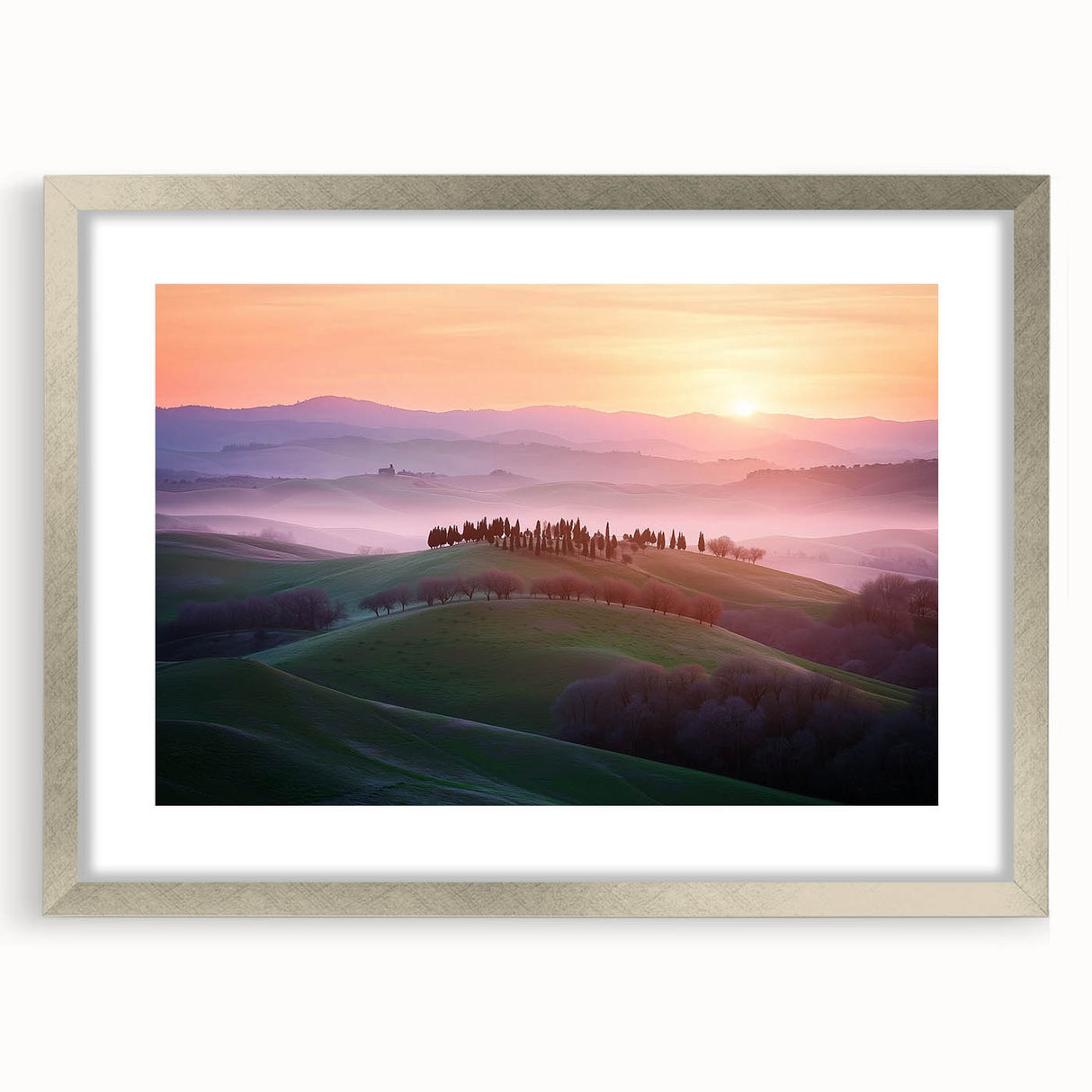 Framed landscape artwork featuring vibrant fields in a silver mat, showcasing a serene countryside scene with rich green and golden hues, perfect for home decor.