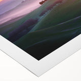 Rolled canvas showcasing a vibrant landscape design with lush green fields and a serene sky, elegantly packaged in a protective cardboard tube for safe delivery.