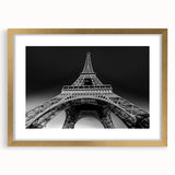Abstract art print of Paris scenery in muted gold and blue tones on a framed canvas, suitable for dining room decor.