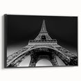 Black and white vintage poster art of a Paris landscape on framed canvas, ideal for bedroom decor.