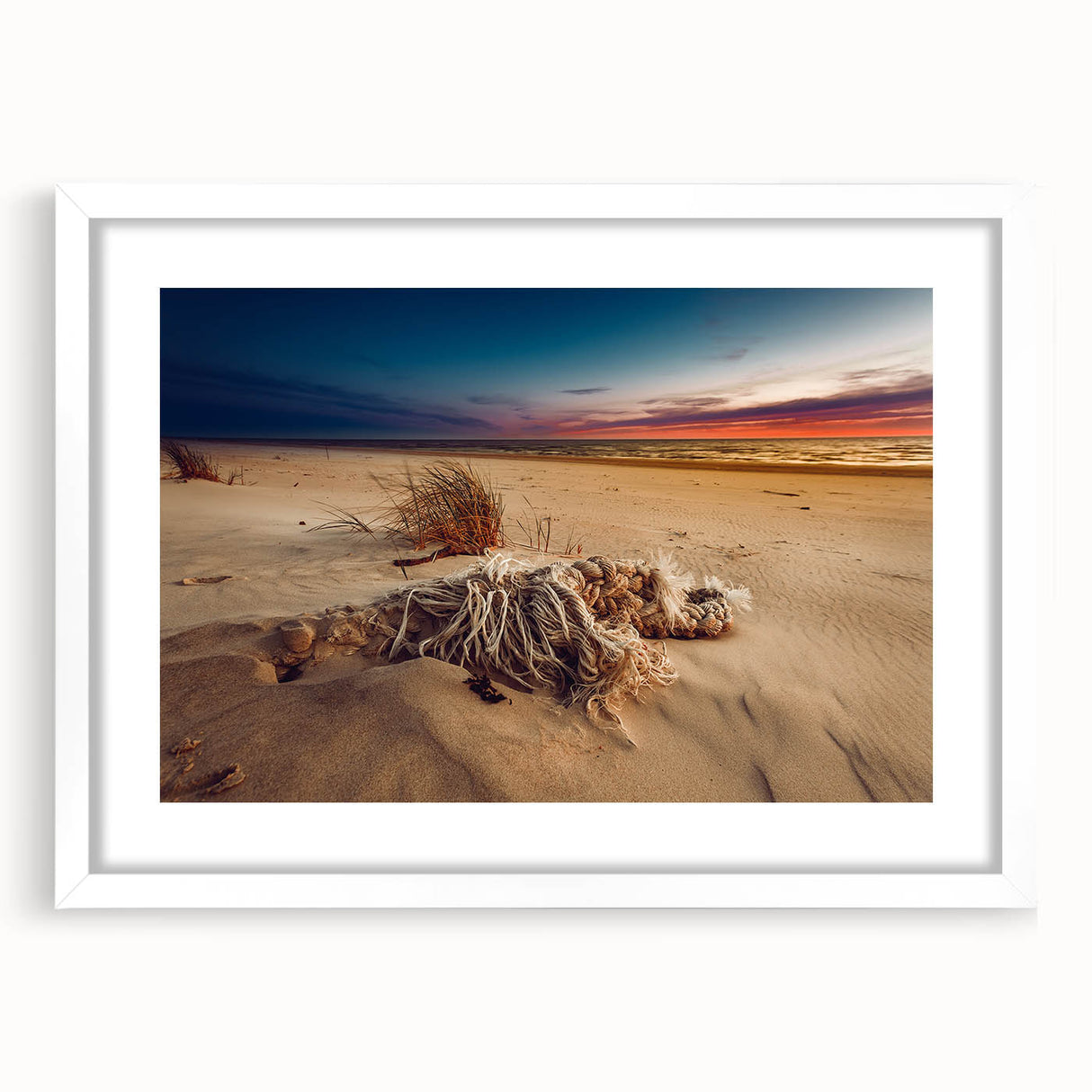 Textured abstract art print of a European scenery in muted earth tones, framed with a white mat, ideal for bedroom decor.