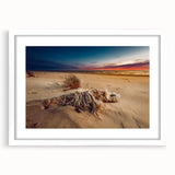 Textured abstract art print of a European scenery in muted earth tones, framed with a white mat, ideal for bedroom decor.