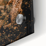 Large abstract wall art depicting falling leaves in orange and brown hues on acrylic glass, ideal for dining room ambiance.