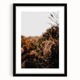 Extra large abstract art print depicting vibrant fall colors on a textured canvas, framed in black.