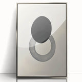 Framed abstract minimalist wall art featuring a silver acrylic front, showcasing fluid shapes and neutral tones, perfect for modern home décor and art enthusiasts.