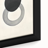 Close-up of a framed abstract minimalist wall art piece showcasing soft pastel colors and geometric shapes, perfect for modern home decor.