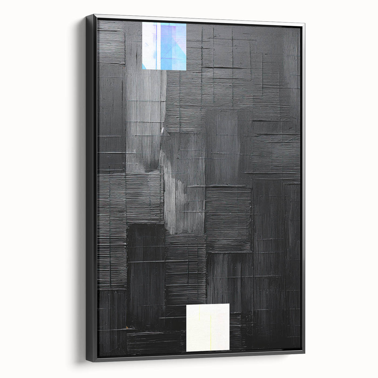 Minimalist black framed canvas wall art showcasing an abstract design, viewed from the side to highlight its sleek profile and modern aesthetic, perfect for contemporary decor.