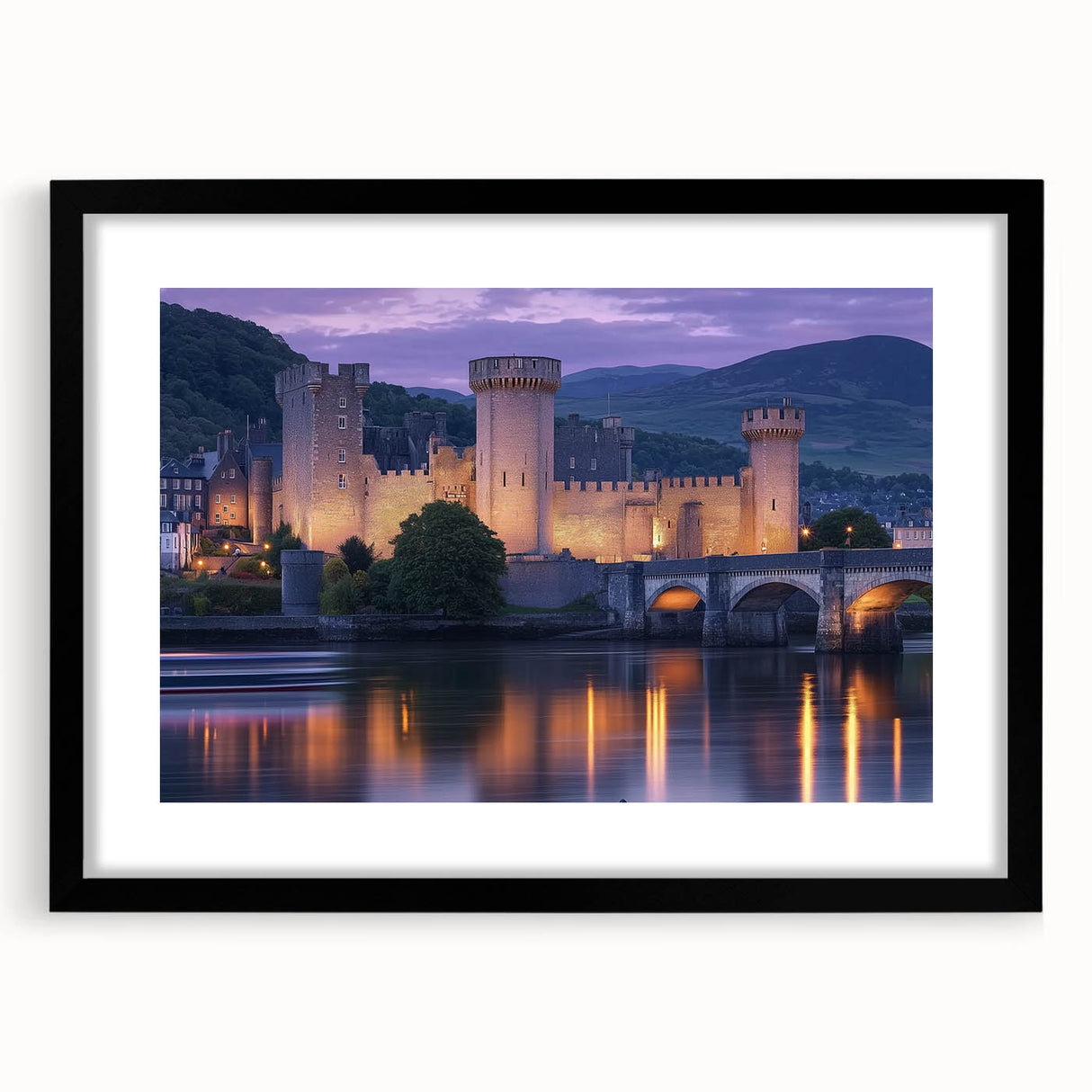Elegant black-framed landscape artwork featuring a majestic castle surrounded by lush greenery, displayed with a white mat for a refined presentation. Perfect for home decor enthusiasts seeking a touch of sophistication.