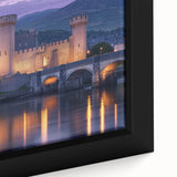 Close-up of a framed canvas artwork showcasing a picturesque landscape with a medieval castle, rich colors, and intricate details, perfect for home decor.