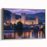 Framed canvas artwork depicting a picturesque landscape with a majestic castle, featuring a gold frame and side view, perfect for enhancing home decor and elegance.