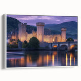 Framed canvas artwork showcasing a vibrant landscape with a majestic castle, set against a serene backdrop of lush greenery and blue skies, ideal for home decor.