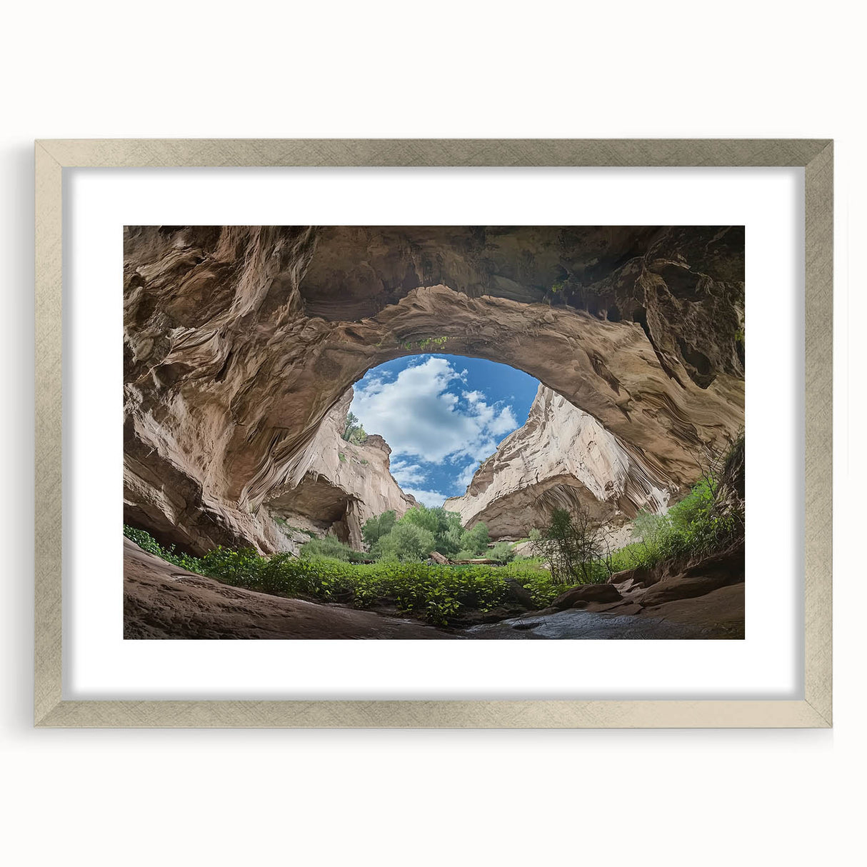 Framed landscape artwork showcasing a serene cave scene, elegantly matted and finished with a silver frame, perfect for enhancing modern home decor.