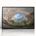 Framed acrylic artwork showcasing a stunning cave landscape, featuring rich colors and intricate details, set against a sleek black frame for modern decor. Perfect for enhancing home or office interiors.