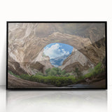 Framed acrylic artwork showcasing a stunning cave landscape, featuring rich colors and intricate details, set against a sleek black frame for modern decor. Perfect for enhancing home or office interiors.