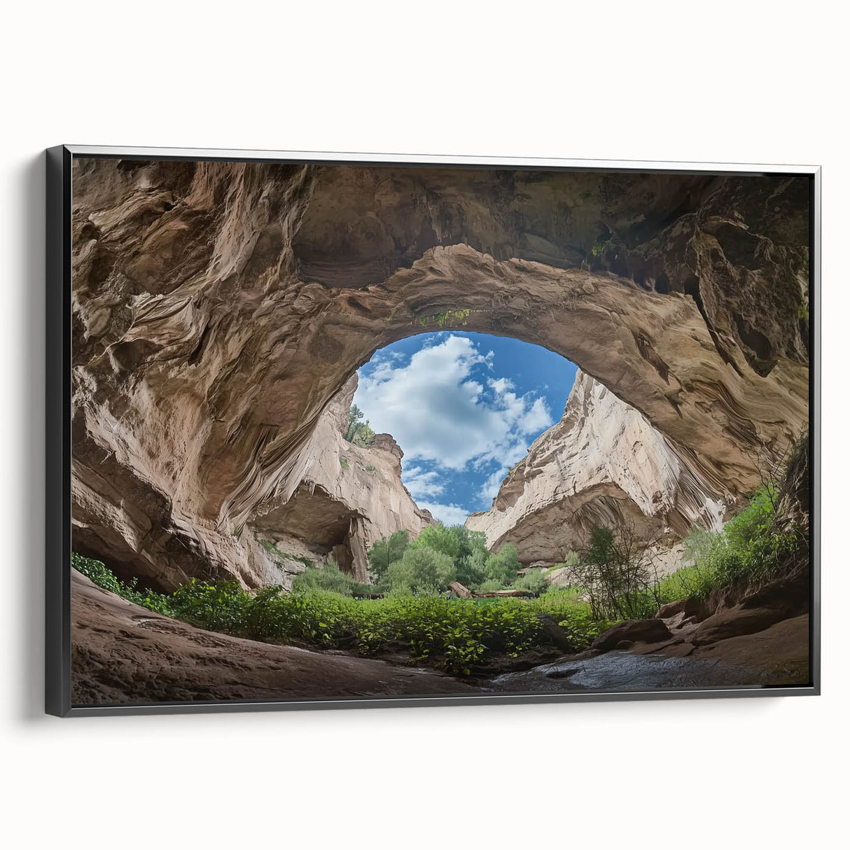 Framed canvas artwork depicting a stunning landscape with caves, featuring a black side view. This modern decor piece adds elegance to any interior space.