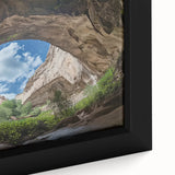 Close-up of a framed canvas depicting a vibrant cave landscape with rich textures and earthy colors, perfect for enhancing modern home decor.