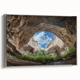 Framed canvas artwork depicting a stunning landscape with caves, highlighted by a silver frame, perfect for enhancing modern home décor and wall aesthetics.